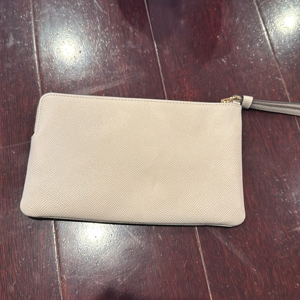 Coach off white brand new wristlet.